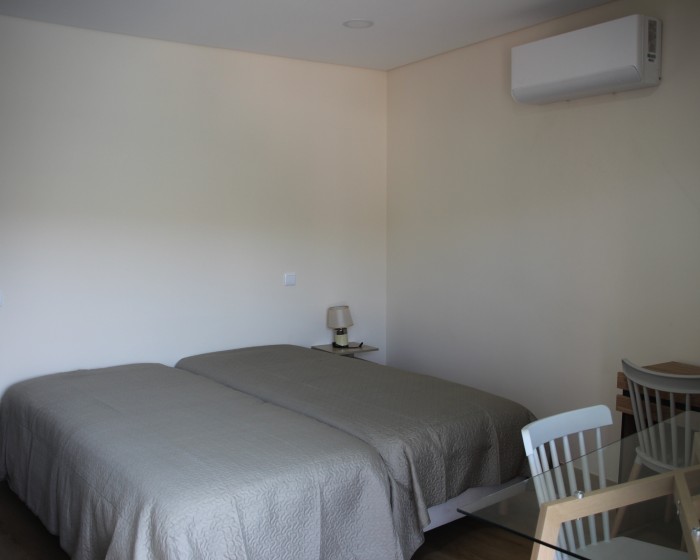 Suite T0 superior com vista para piscina e montanha